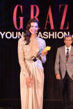 Deepika Padukone after receiving the Grazia Young Fashion Awards 2013 Girl of the Year...jpg